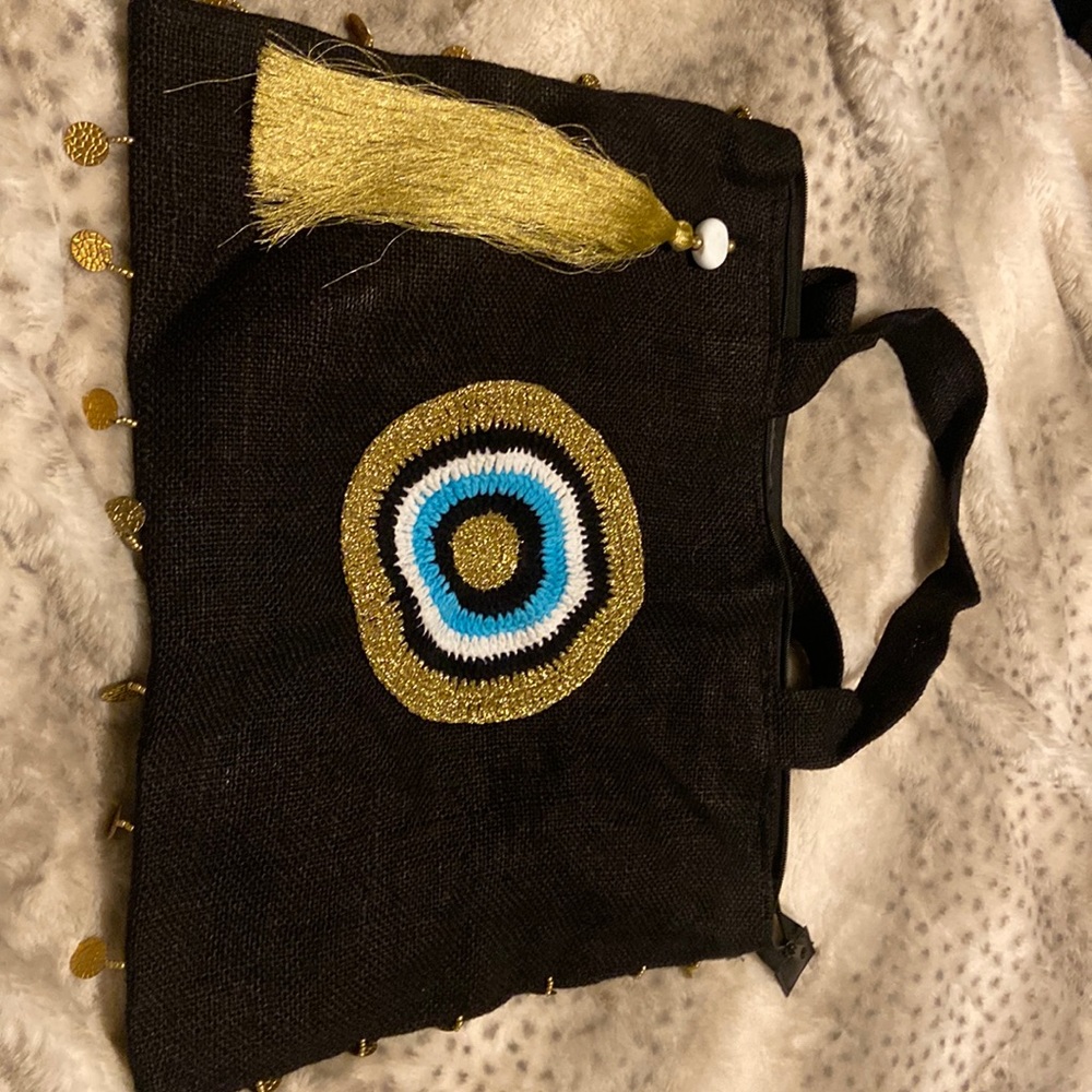 Trendy evil eye tote bag. Burlap exterior, fun! Large interior.
